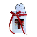 White cardboard pop top gift box with see through window contains 100ml bottle of Birch Q Sauce Original and 100ml bottle of Birch Q Sauce Bourbon Chipotle flavors. This is a great gift for anyone who likes to grill or use dip for chicken wings, chicken tenders, ribs and steak bites.