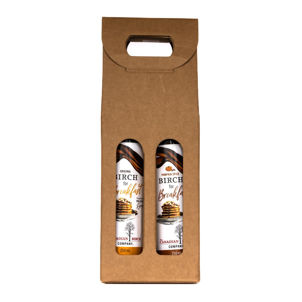 Flap Jack Pack gift set in a craft paper upright box, with Birch for Breakfast Original and Pumpkin Spice flavors peaking through the box window