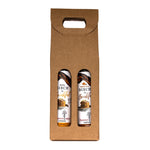 Flap Jack Pack gift set in a craft paper upright box, with Birch for Breakfast Original and Pumpkin Spice flavors peaking through the box window